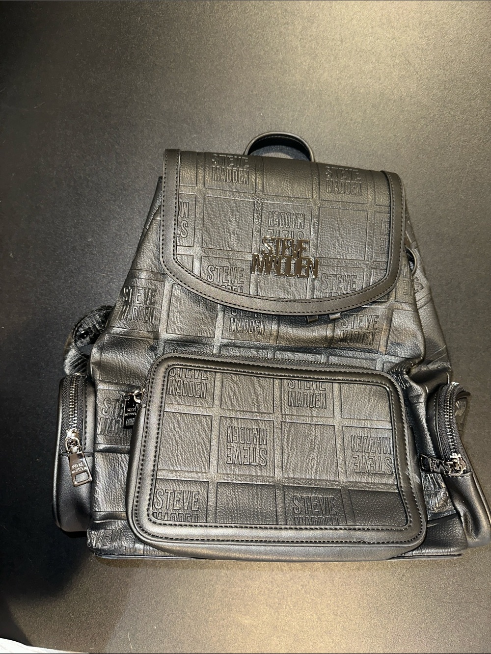 Steve Madden Black Embossed Logo Backpack